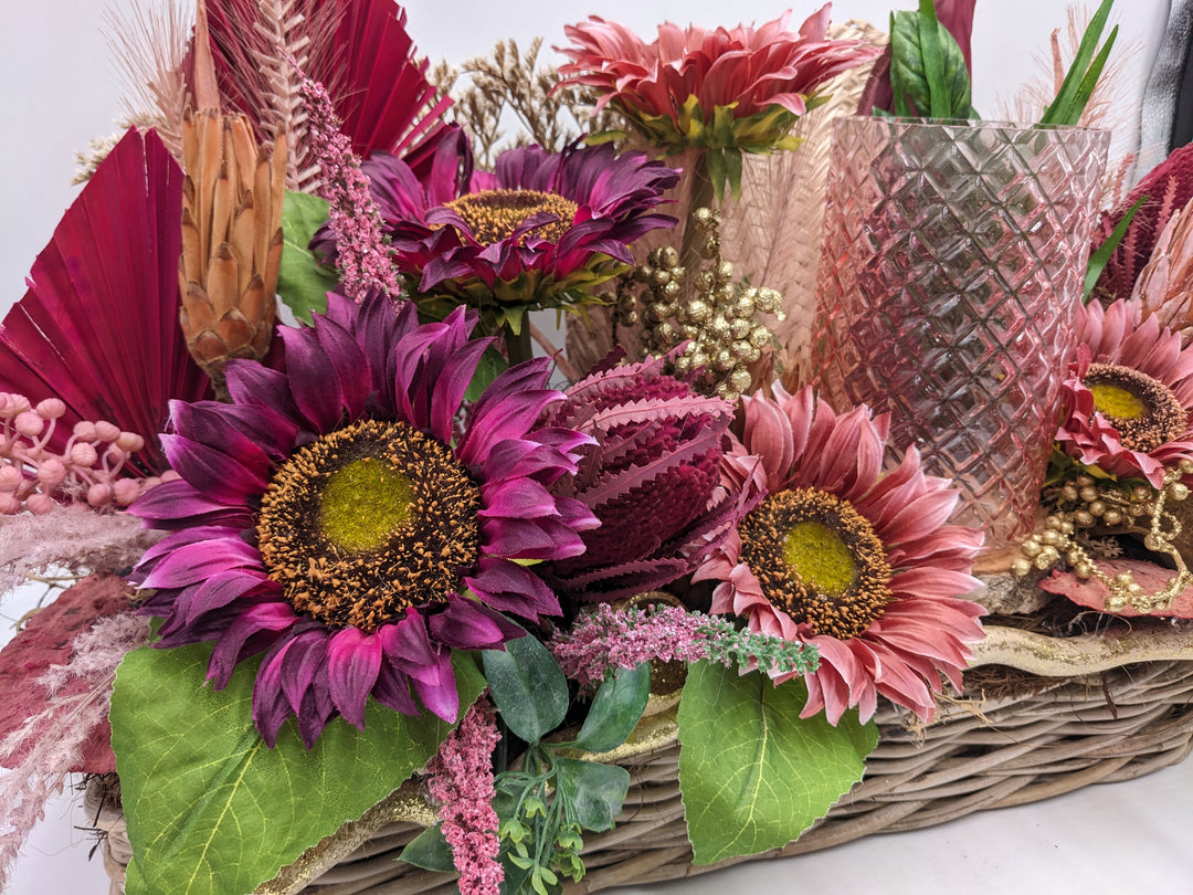 Sommergesteck Sonnenblumen Teelicht rosa