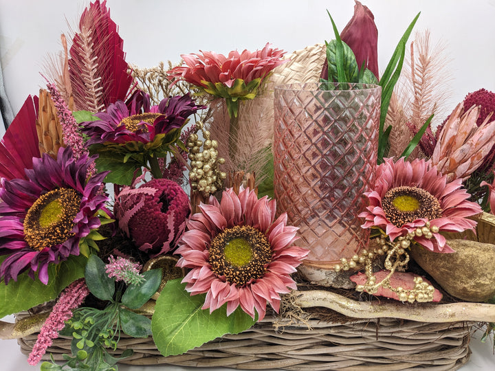 Sommergesteck Sonnenblumen Teelicht rosa