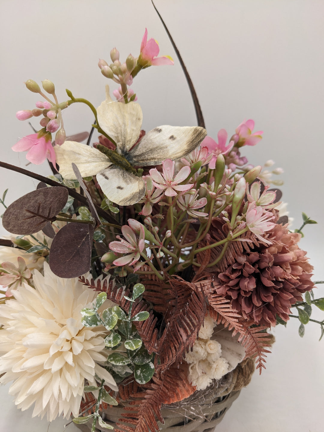 Herbstgesteck Sonnenblumen Heide rosa