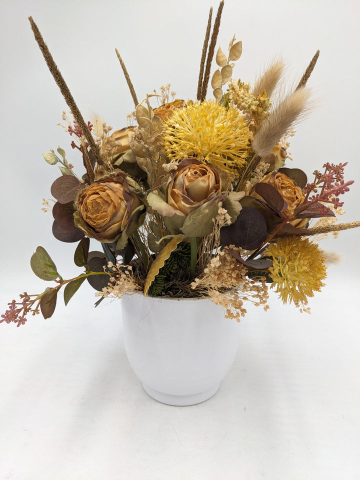 Herbstgesteck Rosen Gräser Curry gelb