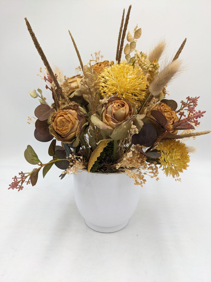Herbstgesteck Rosen Gräser Curry gelb