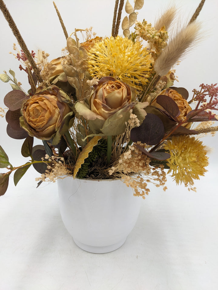 Herbstgesteck Rosen Gräser Curry gelb
