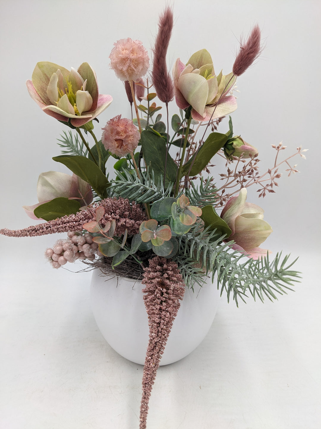 Frühlingsgesteck Christrose Gräser mint rosa