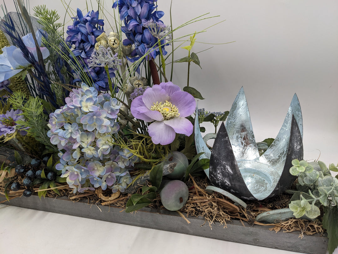 Frühlingsgesteck Teelicht lila blau