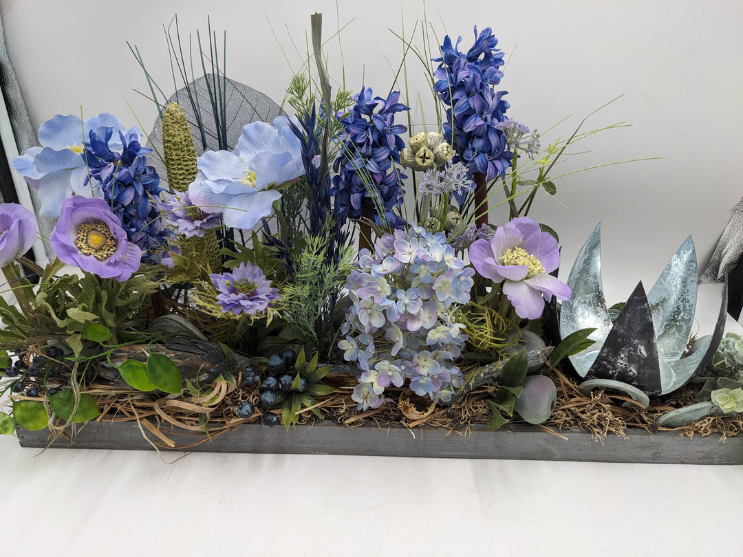 Frühlingsgesteck Teelicht lila blau