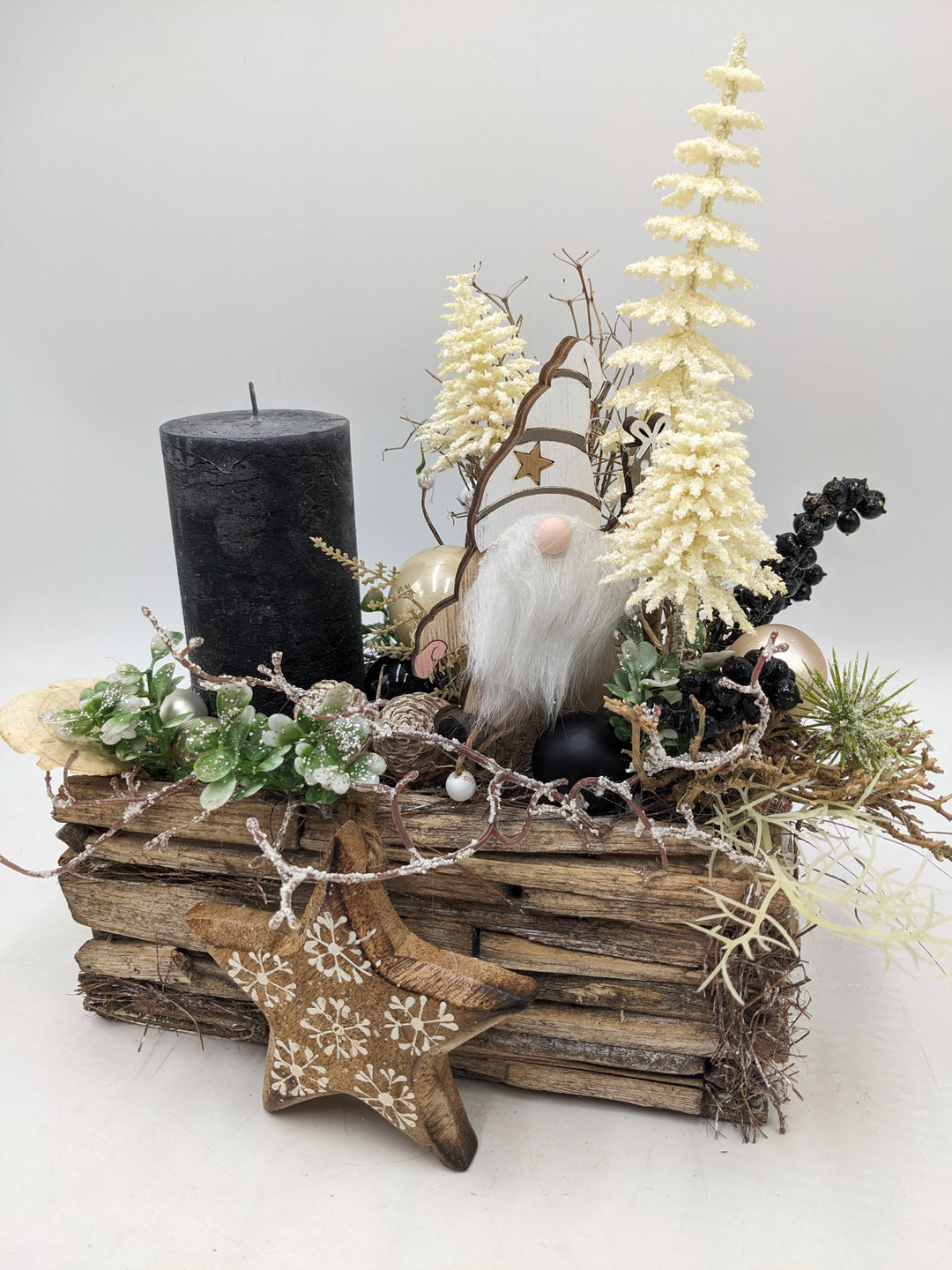 Weihnachtsgesteck Stern Wichtel schwarz creme
