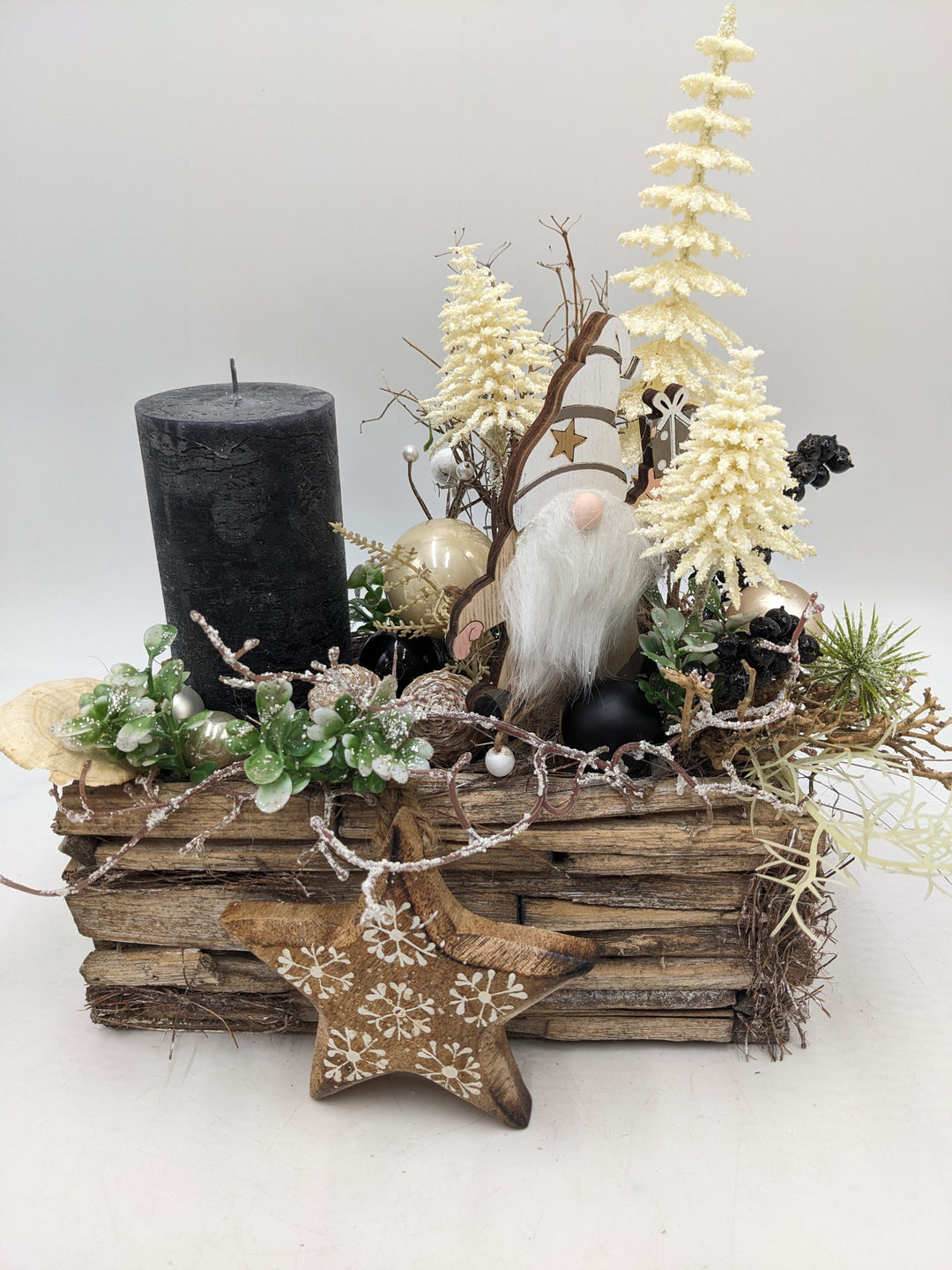Weihnachtsgesteck Stern Wichtel schwarz creme