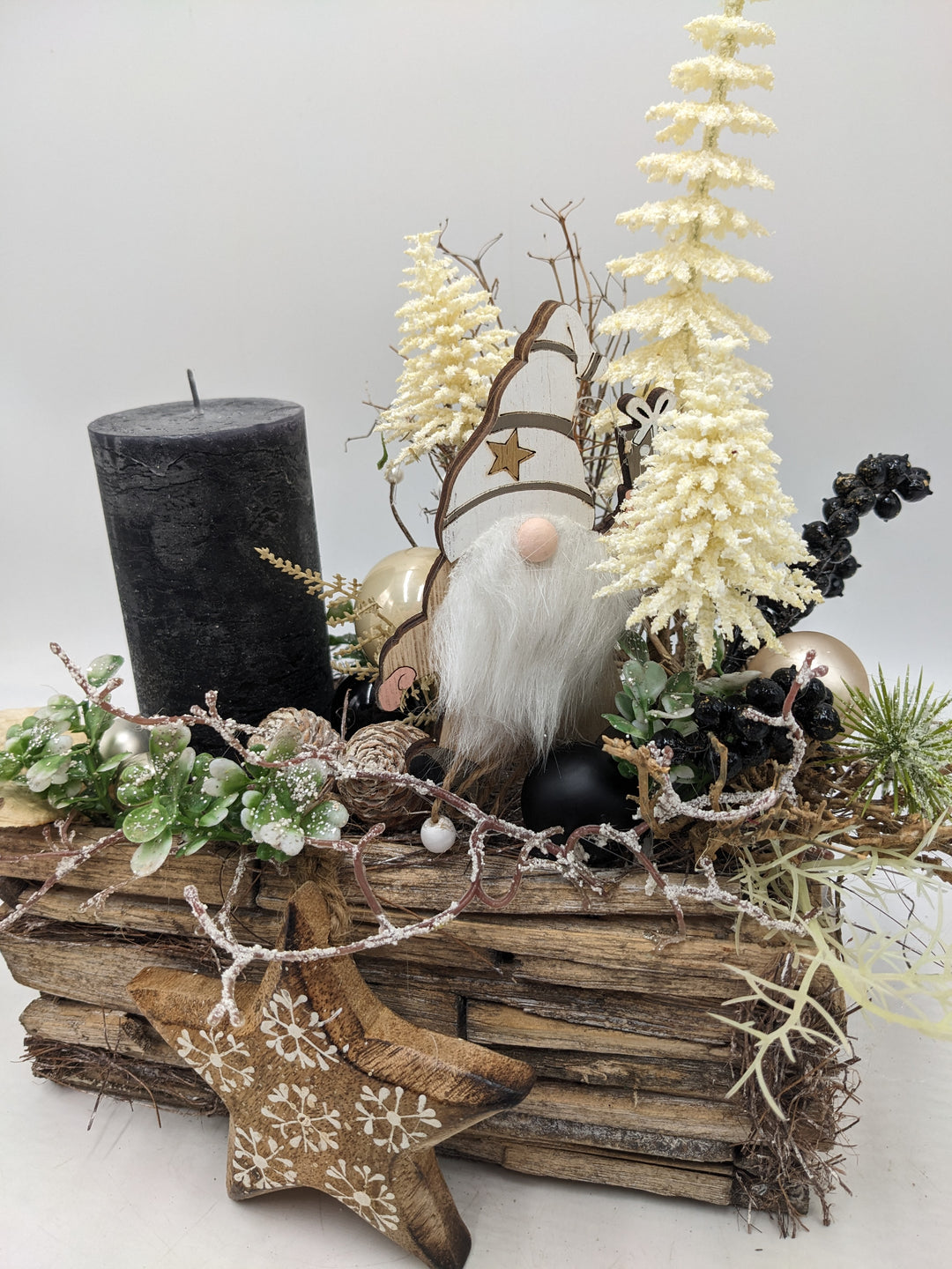 Weihnachtsgesteck Stern Wichtel schwarz creme