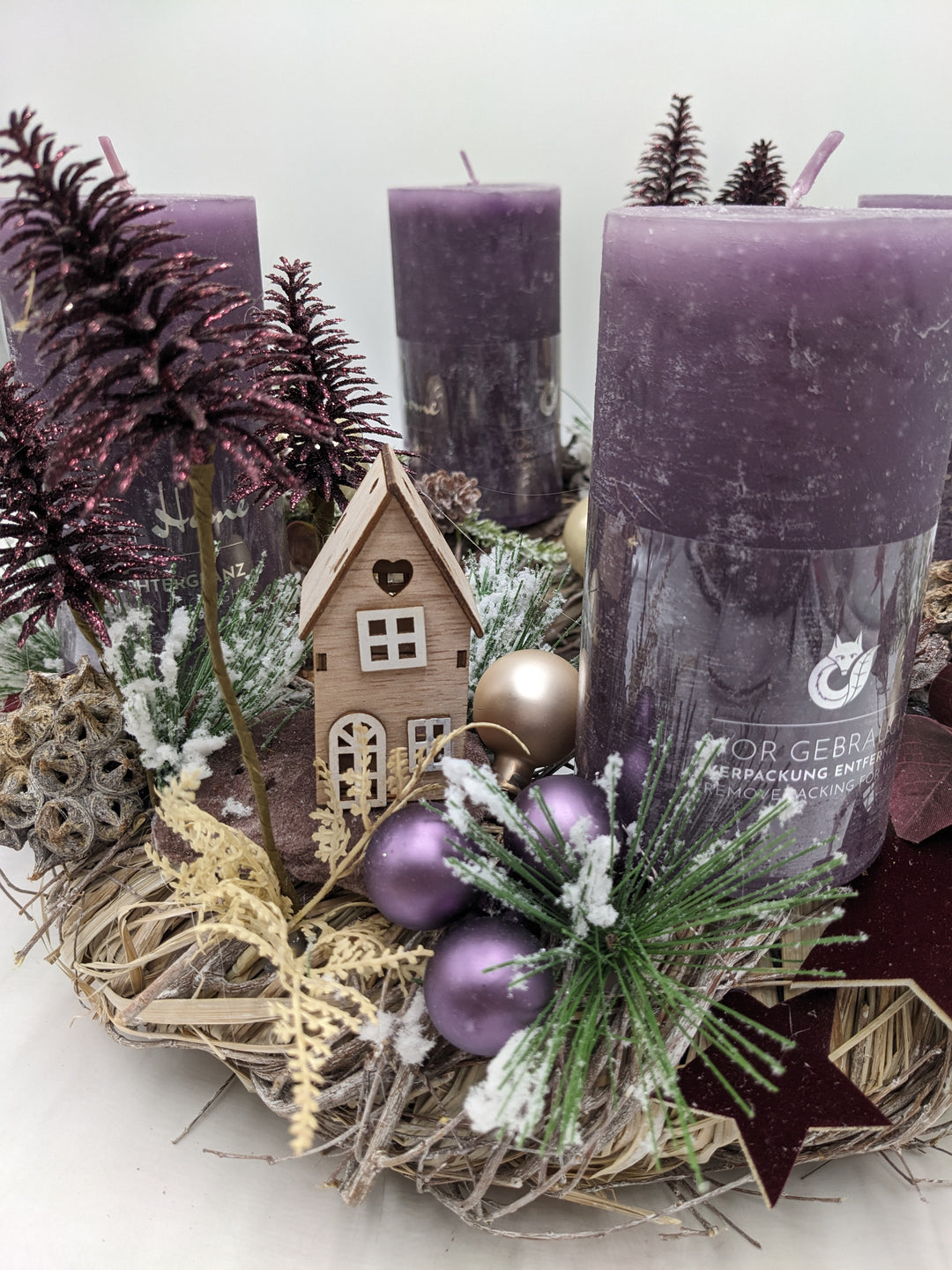 Adventskranz Häuser Bäume Sterne lila