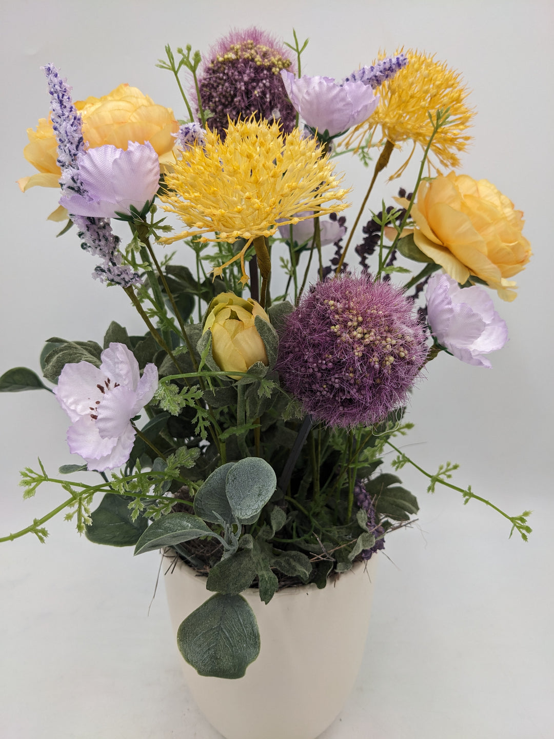 Sommergesteck Wiesenblumen Allium orange lila