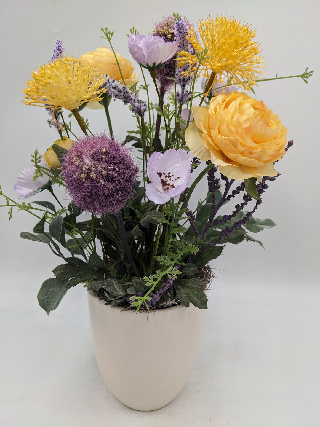 Sommergesteck Wiesenblumen Allium orange lila