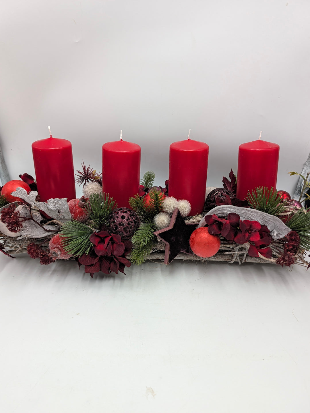 Adventsgesteck Stern Hortensie rot