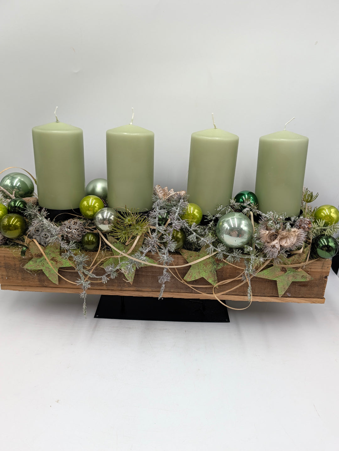 Adventsgesteck Sterne Zapfen