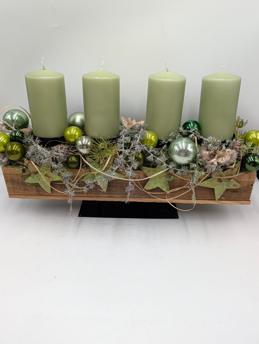 Adventsgesteck Sterne Zapfen
