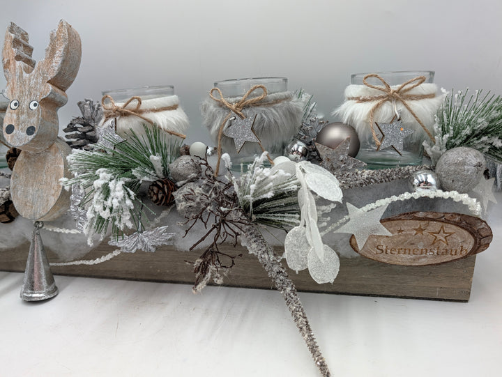 Weihnachtsgesteck Elch Teelichter Zapfen silber