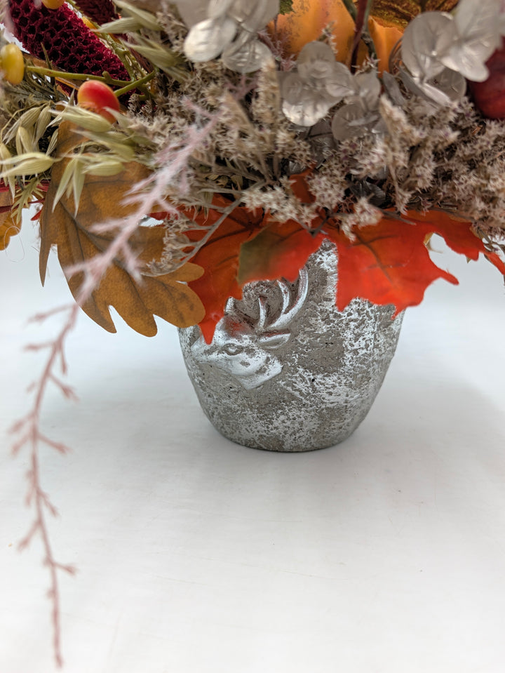 Herbstgesteck Kürbis Gräser orange silber