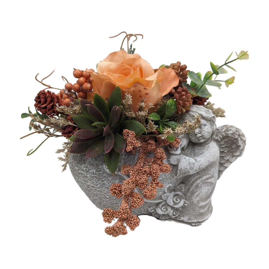 Freigestellt Trauergesteck Engel Rose Zapfen apricot orange