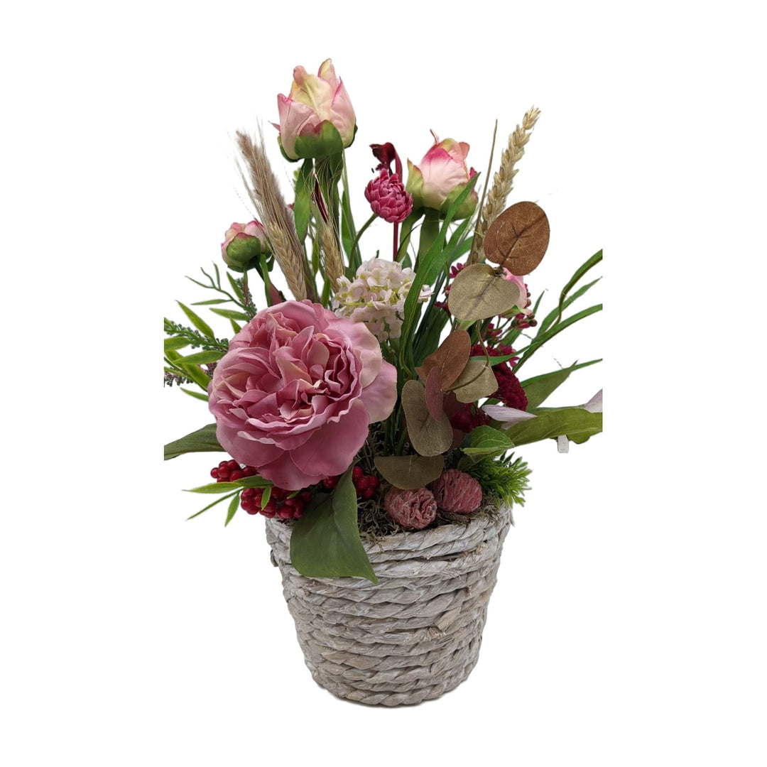 Freigestellt Herbstgesteck Rosen Beeren Gräser Heide rosa grün im Korb