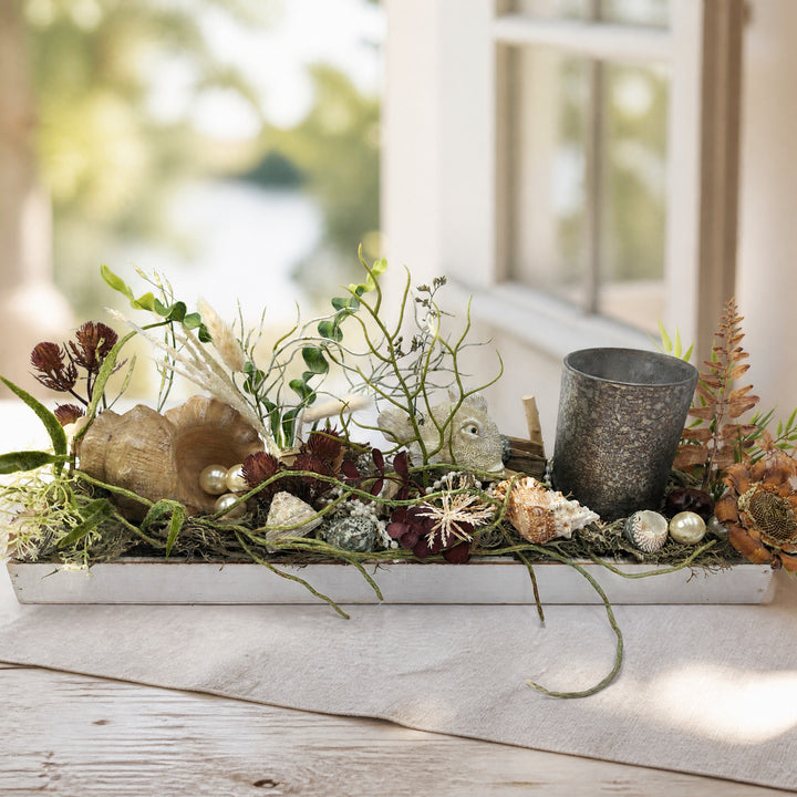 Szene Sommergesteck maritim Teelichtglas Muscheln Schneckenhaus natur creme