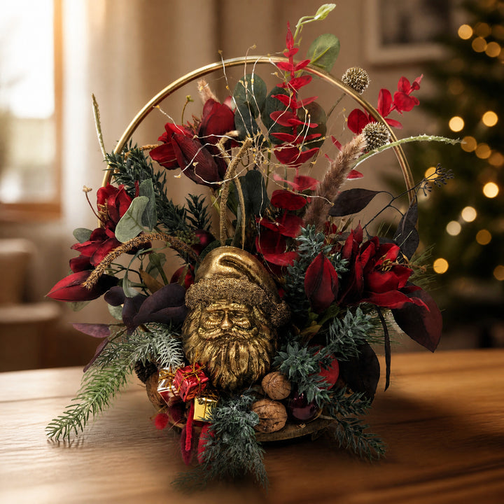 Szene Weihnachtsgesteck Weihnachtsmann Amaryllis Kugeln LED gold rot