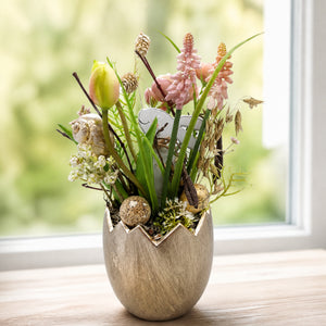 Szene Ostergesteck Traubenhyazinthe Tulpe Hase Ei im Eiertopf rosa gold
