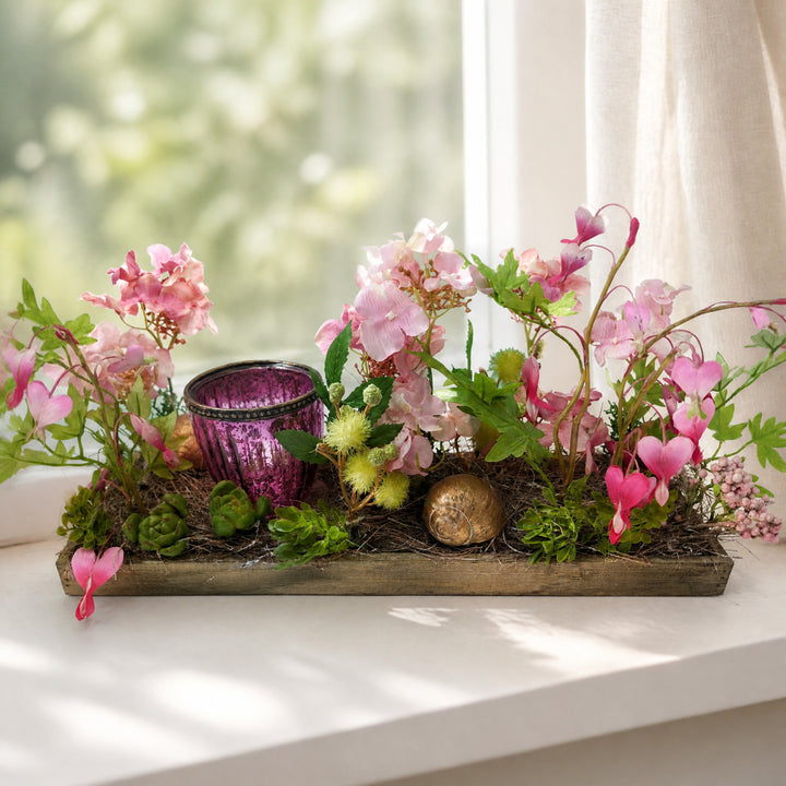 Szene Frühlingsgesteck Tränendes Herz Hortensie Teelicht rosa