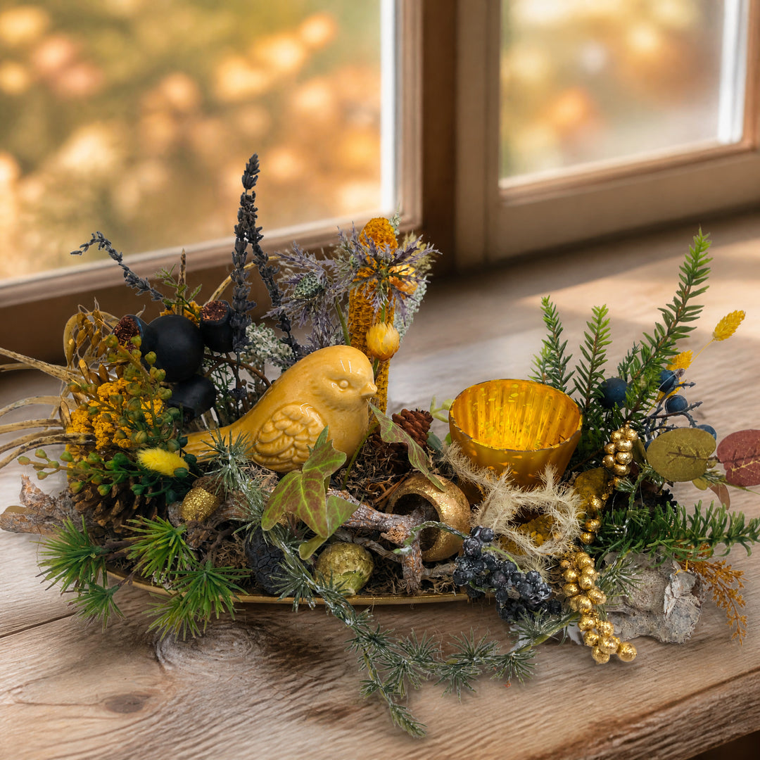 Szene Herbstgesteck Vogel Gräser Heide gold gelb mit Windlicht
