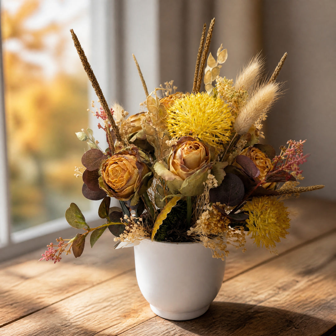 Szene Herbstgesteck Rosen Gräser Eukalyptus curry gelb braun