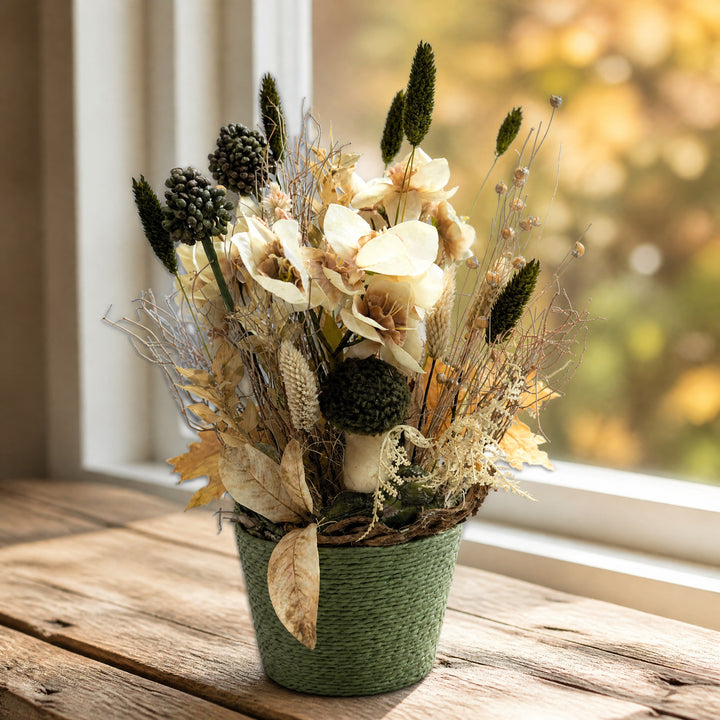 Szene Herbstgesteck Amaryllis Pilz Gräser creme grün