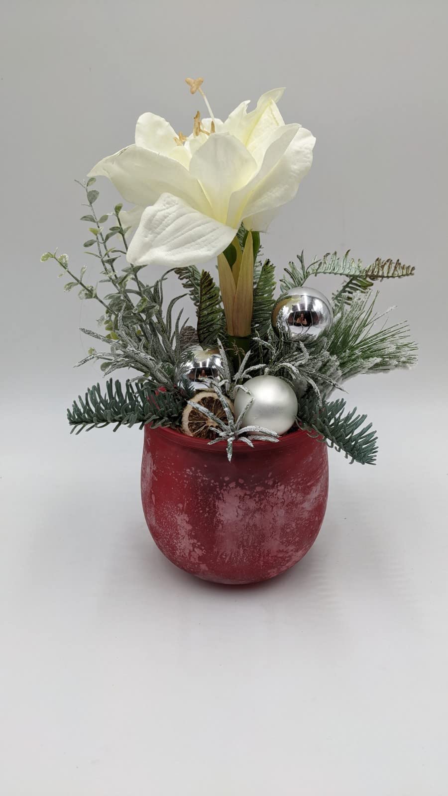 Wintergesteck Weihnachtsgesteck Amaryllis Tanne Kugeln rot weiß