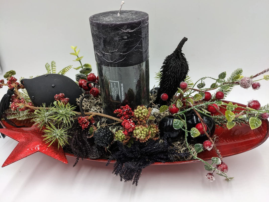 Wintergesteck Weihnachtsgesteck Tischgesteck Kugel Stern Kerze Beeren Tanne schwarz rot