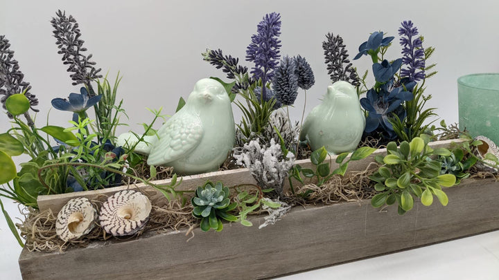 Tischgesteck Sommergesteck Teelicht Vögel Lavendel Schnecken Gräser mint lila