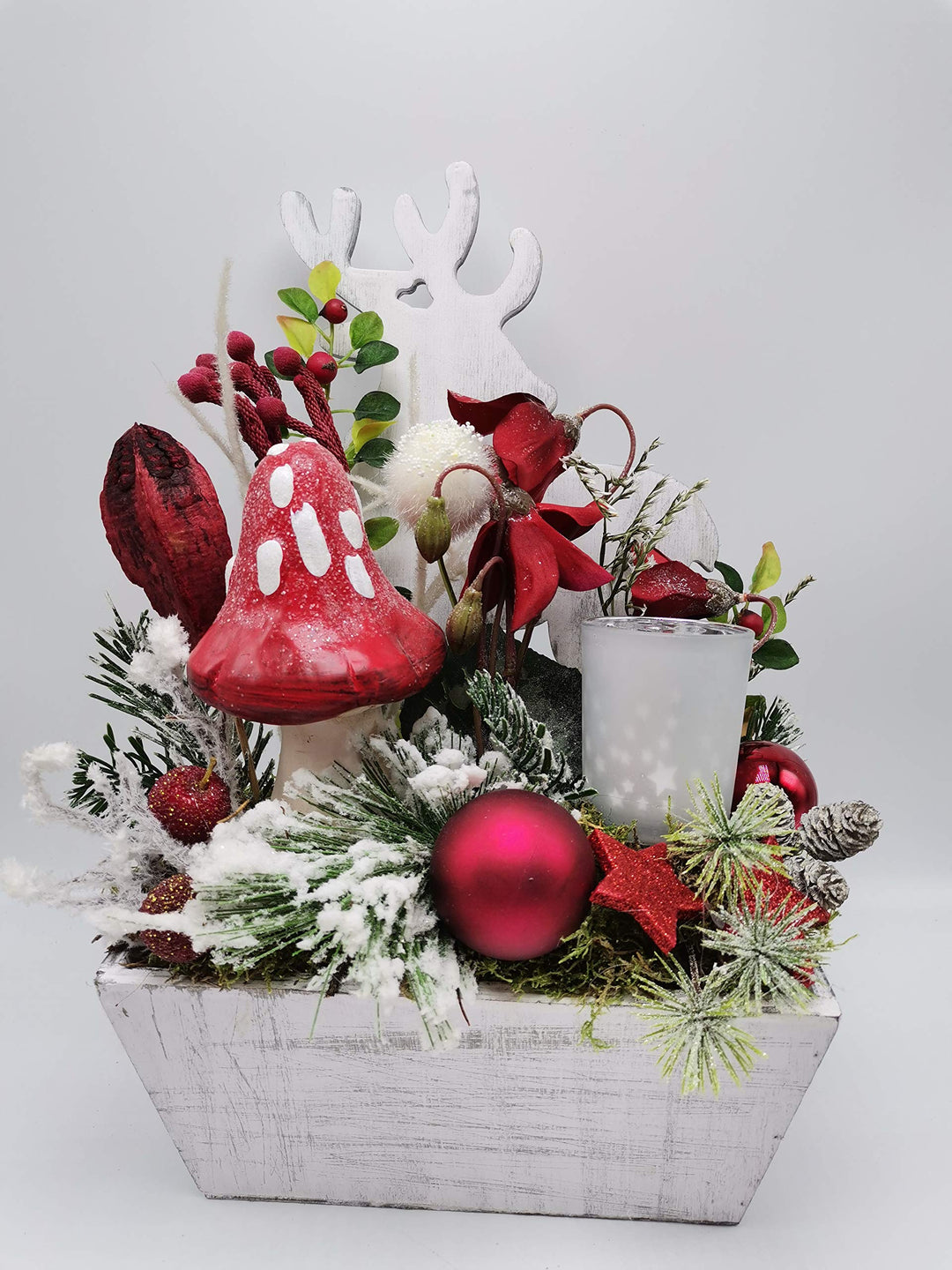 Weihnachtsgesteck Adventsgesteck Winterdekoration Teelicht Pilz Blüten Kugeln rot weiß